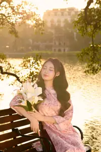 Gentle Vietnamese Beauty: Pink Ao Dai by the Lake, with Pure Lilies - image 2