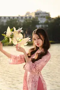 Gentle Vietnamese Beauty: Pink Ao Dai by the Lake, with Pure Lilies - image 3