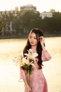 Gentle Vietnamese Beauty: Pink Ao Dai by the Lake, with Pure Lilies - image 5