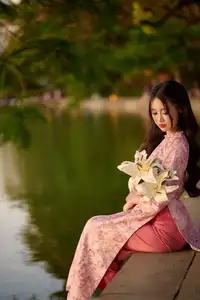 Gentle Vietnamese Beauty: Pink Ao Dai by the Lake, with Pure Lilies - image 15