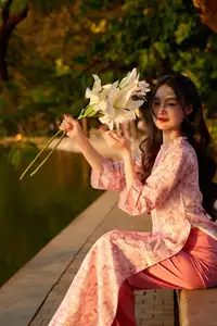 Gentle Vietnamese Beauty: Pink Ao Dai by the Lake, with Pure Lilies - image 14