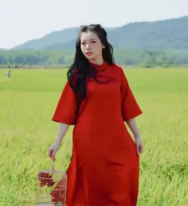 Discover the Serene Beauty: Vietnamese Girl in Red Ao Dai Amidst Green Rice Fields - image 6