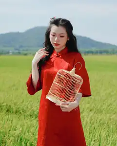 Discover the Serene Beauty: Vietnamese Girl in Red Ao Dai Amidst Green Rice Fields - image 17
