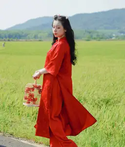 Discover the Serene Beauty: Vietnamese Girl in Red Ao Dai Amidst Green Rice Fields - image 20