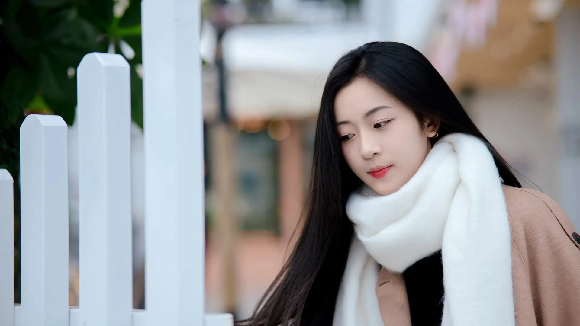 Captivating Autumn Winter Charm: Pensive Girl with Pure White Scarf, Elegant Street Style