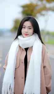 Captivating Autumn Winter Charm: Pensive Girl with Pure White Scarf, Elegant Street Style - image 7