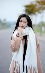 Captivating Autumn Winter Charm: Pensive Girl with Pure White Scarf, Elegant Street Style - image 2