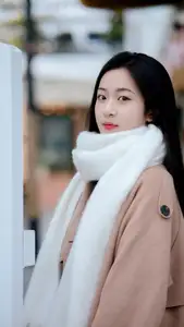 Captivating Autumn Winter Charm: Pensive Girl with Pure White Scarf, Elegant Street Style - image 5