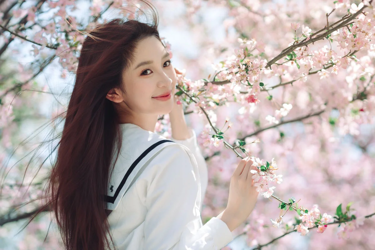 Spring Muse: Pure Elegance in JK Uniform Amidst Blossoms