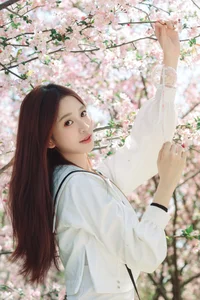 Spring Muse: Pure Elegance in JK Uniform Amidst Blossoms - image 4