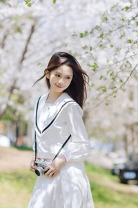 Spring Muse: Pure Elegance in JK Uniform Amidst Blossoms - image 20