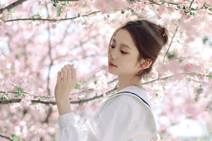Spring Muse: Pure Elegance in JK Uniform Amidst Blossoms - image 10