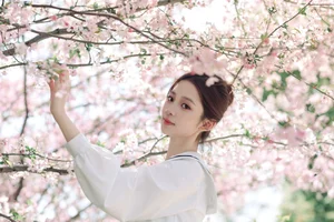 Spring Muse: Pure Elegance in JK Uniform Amidst Blossoms - image 26