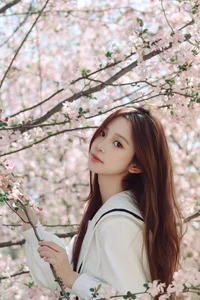 Spring Muse: Pure Elegance in JK Uniform Amidst Blossoms - image 8