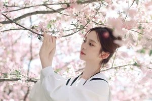 Spring Muse: Pure Elegance in JK Uniform Amidst Blossoms - image 7