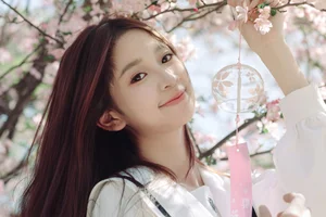 Spring Muse: Pure Elegance in JK Uniform Amidst Blossoms - image 17