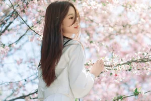 Spring Muse: Pure Elegance in JK Uniform Amidst Blossoms - image 11