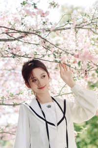 Spring Muse: Pure Elegance in JK Uniform Amidst Blossoms - image 29