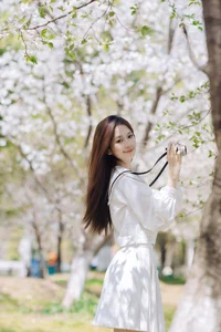 Spring Muse: Pure Elegance in JK Uniform Amidst Blossoms - image 13