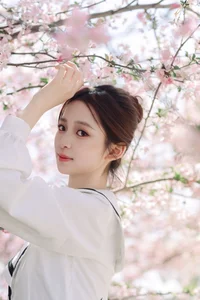 Spring Muse: Pure Elegance in JK Uniform Amidst Blossoms - image 14