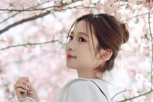 Spring Muse: Pure Elegance in JK Uniform Amidst Blossoms - image 32