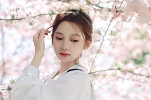 Spring Muse: Pure Elegance in JK Uniform Amidst Blossoms - image 27