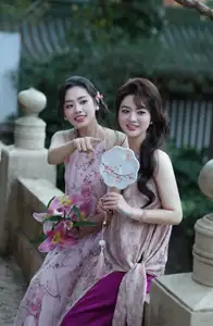 Enchanting Vietnamese Beauty: A Graceful Portrait in Modern Traditional Dress and Fan - image 12