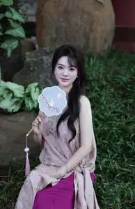Enchanting Vietnamese Beauty: A Graceful Portrait in Modern Traditional Dress and Fan - image 4