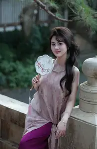 Enchanting Vietnamese Beauty: A Graceful Portrait in Modern Traditional Dress and Fan - image 13