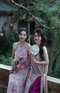 Enchanting Vietnamese Beauty: A Graceful Portrait in Modern Traditional Dress and Fan - image 1