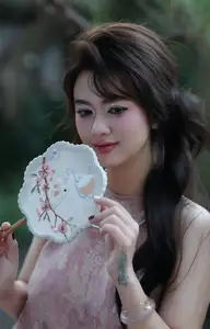 Enchanting Vietnamese Beauty: A Graceful Portrait in Modern Traditional Dress and Fan - image 10