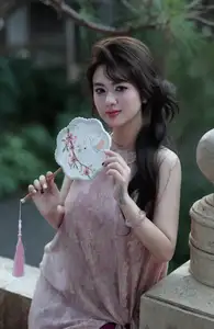 Enchanting Vietnamese Beauty: A Graceful Portrait in Modern Traditional Dress and Fan - image 9