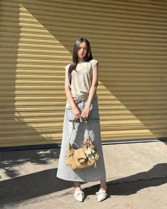 Chic Feminine Style Inspiration: Elegant Skirts and Modern Outfits Inspired by Miss Vietnam Thanh Thuy’s Sophisticated Wardrobe - image 4