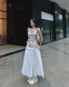 Chic Feminine Style Inspiration: Elegant Skirts and Modern Outfits Inspired by Miss Vietnam Thanh Thuy’s Sophisticated Wardrobe - image 1