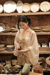 Serene Beauty and Artistic Soul in a Rustic Ceramic Setting - image 3