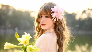 Poetic Muse in White Dress with Pink Lilies - image 1