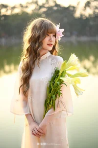 Poetic Muse in White Dress with Pink Lilies - image 4