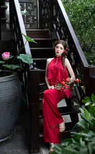 Captivating Asian Girl in Red: Serene Lotus & Rustic Wooden Stairs Scene - image 3