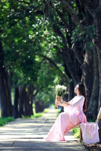 VGU No.150: Graceful Vietnamese Beauty in Pink Ao Dai on a Serene Path - image 4