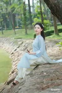 Elegant Vietnamese Maiden in Áo Dài Amidst Serene Nature's Embrace - image 7