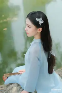 Elegant Vietnamese Maiden in Áo Dài Amidst Serene Nature's Embrace - image 13