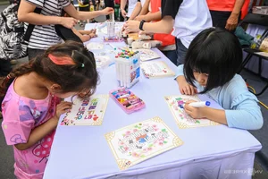 Vietnamese Tourists Embrace Korean Culture: Wearing Traditional Hanbok at the Cultural Festival - image 0