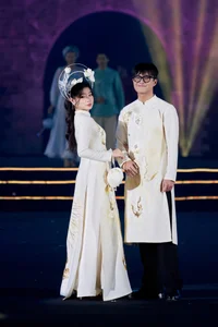 Elegant Vietnamese Fashion: Thảo Vân and Her Son Showcase Traditional Ao Dai Designs - image 7