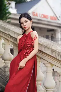 Gentle Vietnamese Girl in Red by Old Railway Bridge: Elegant Asian Beauty - image 6