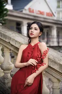 Gentle Vietnamese Girl in Red by Old Railway Bridge: Elegant Asian Beauty - image 2