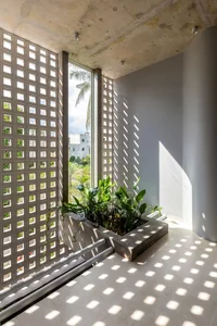 A Serene 4-Story Townhouse Design Infused with Traditional Western Vietnamese Soul - image 13