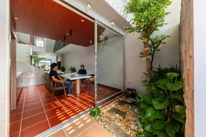 A Serene 4-Story Townhouse Design Infused with Traditional Western Vietnamese Soul - image 2