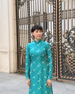 Doan Van Hau’s Mother-in-Law Stuns Netizens with Elegant Ao Dai Photoshoot - image 2