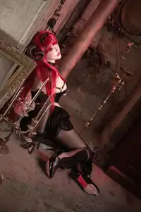 Coser Qie Qie Celia Transforms into Hindenburg: The Alluring Mystique of the Red-Haired Demoness in Unique Cosplay Photoshoot. - image 16