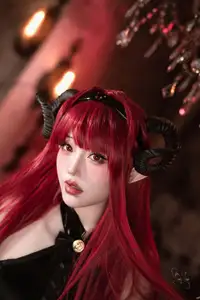 Coser Qie Qie Celia Transforms into Hindenburg: The Alluring Mystique of the Red-Haired Demoness in Unique Cosplay Photoshoot. - image 0